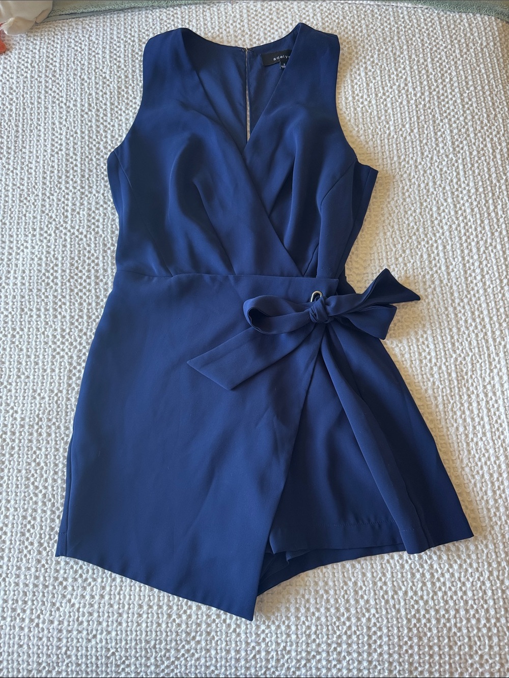 Adelyn Rae Navy Sleeveless Wrap Romper with Side Tie